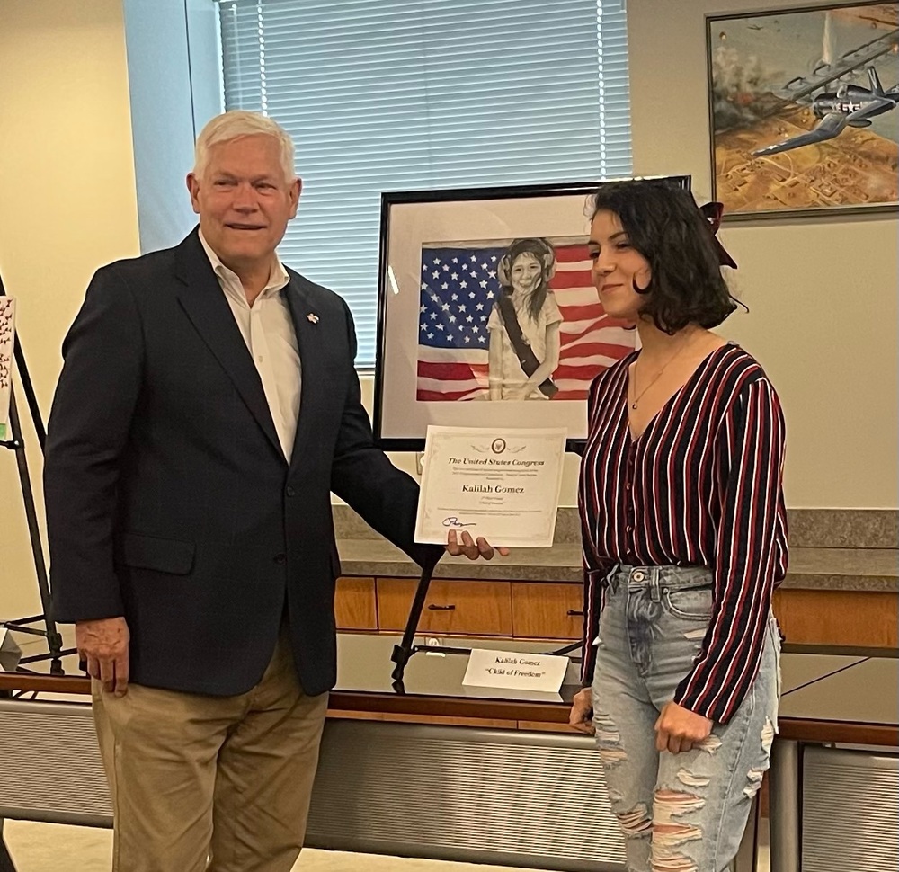 Pete Sessions and Kalilah with winning artwork